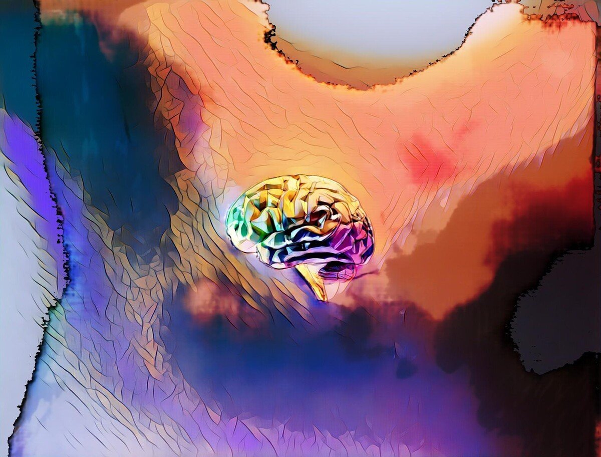 Abstrakte Darstellung eines Gehirns in surrealen Farben und Formen auf einer bunten, strukturierten Hintergrundfläche.
