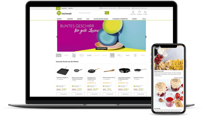Website-Design auf Laptop und Smartphone mit buntem Geschirr, Pfannen, nudeln und Marmeladen im Onlineshop.