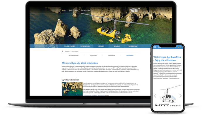 Laptop und Smartphone mit geöffneter Website; zeigt Gyrokopter und Informationen über Gyro-Touren vor einer felsigen Küstensekulisse.